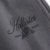 Glitrende logo-grafik Sweatpants med brede ben Glitrende logo-grafik Sweatpants med brede ben