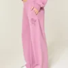Glitrende rosenmotiv Sweatpants med brede ben Glitrende rosenmotiv Sweatpants med brede ben