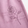 Glitrende rosenmotiv Sweatpants med brede ben Glitrende rosenmotiv Sweatpants med brede ben