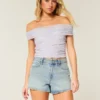 Højtaljede A-line denimshorts i lys vask med distressed-look Højtaljede A-line denimshorts i lys vask med distressed-look