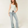 Højtaljede jeans med medium vask og udvidede ben Højtaljede jeans med medium vask og udvidede ben