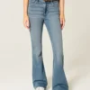 Højtaljede jeans med medium vask og udvidede ben Højtaljede jeans med medium vask og udvidede ben