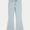 Højtaljede, lysvaskede flare-jeans med broderet hjerte Højtaljede, lysvaskede flare-jeans med broderet hjerte