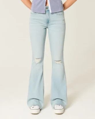 Højtaljede, revne, lysvaskede flare-jeans