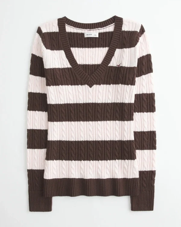 Ikonisk sweater med V-hals og kabelstrik Ikonisk sweater med V-hals og kabelstrik