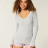 Kabelstrikket ikonisk V-hals sweater