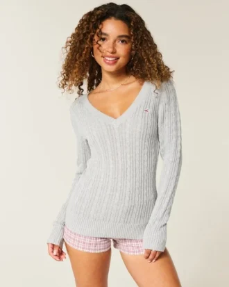 Kabelstrikket ikonisk V-hals sweater
