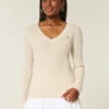 Kabelstrikket ikonisk V-hals sweater