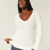 Kabelstrikket ikonisk V-hals sweater