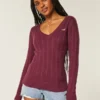 Kabelstrikket ikonisk V-hals sweater