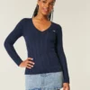 Kabelstrikket ikonisk V-hals sweater