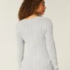 Kabelstrikket ikonisk V-hals sweater