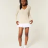 Kabelstrikket ikonisk V-hals sweater