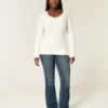Kabelstrikket ikonisk V-hals sweater