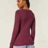 Kabelstrikket ikonisk V-hals sweater