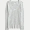 Kabelstrikket ikonisk V-hals sweater