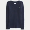 Kabelstrikket ikonisk V-hals sweater
