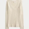 Kabelstrikket ikonisk V-hals sweater