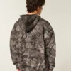 Kasseformet camouflage-hoodie med lynlås og termofoer Kasseformet camouflage-hoodie med lynlås og termofoer