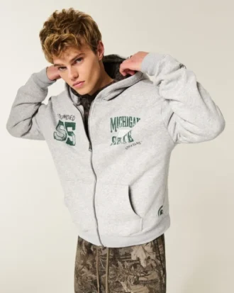 Kasseformet Michigan State University Spartans-grafik-hoodie med lynlås Kasseformet Michigan State University Spartans-grafik-hoodie med lynlås