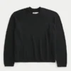 Kasseformet sweater med rullekrave