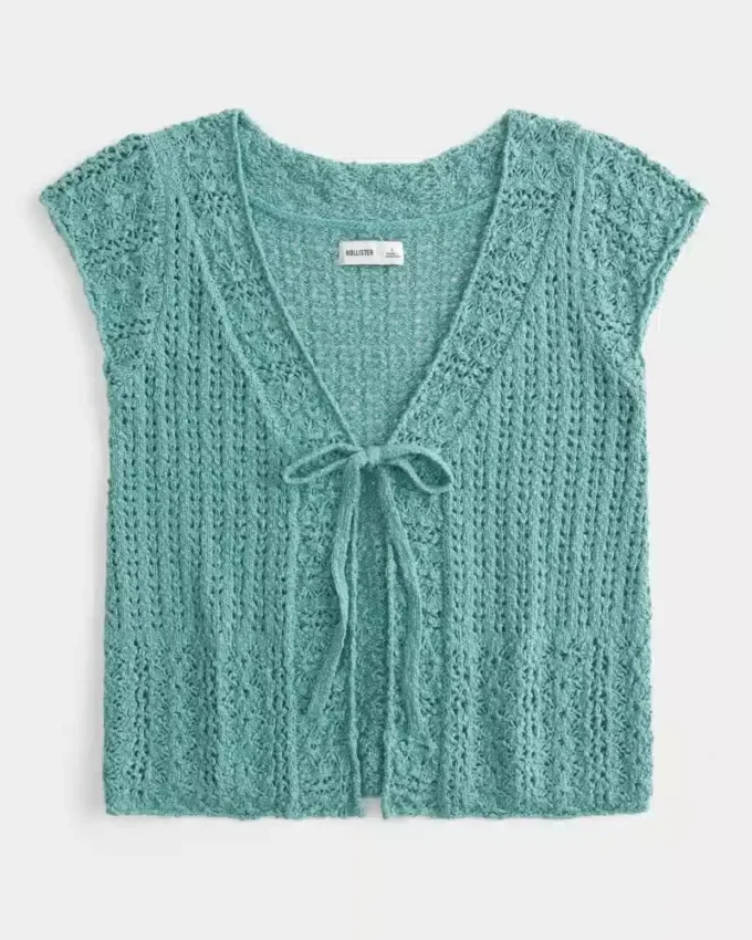 Kortærmet cardigan i hæklet stil