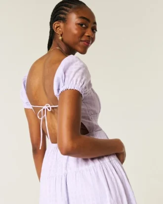 Kortærmet maxi-kjole med åben ryg Kortærmet maxi-kjole med åben ryg