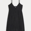 Lang tank top med blondedetaljer Lang tank top med blondedetaljer