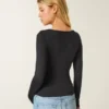 Langærmet baby-T-shirt i sømløst stof