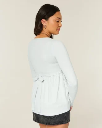 Langærmet babydoll-top med grafisk print og pinch bust