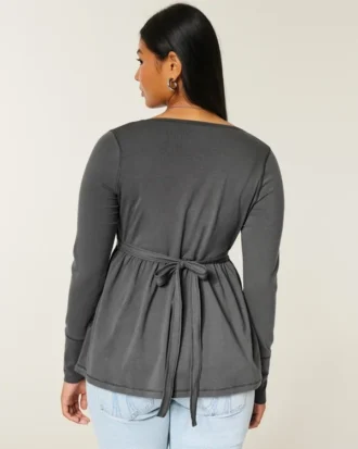 Langærmet babydoll-top med grafisk print og pinch bust