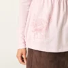Langærmet babydoll-top med grafisk print og pinch bust Langærmet babydoll-top med grafisk print og pinch bust