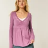 Langærmet babydoll-top med klemning ved brystet Langærmet babydoll-top med klemning ved brystet