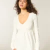 Langærmet babydoll-top med klemning ved brystet Langærmet babydoll-top med klemning ved brystet
