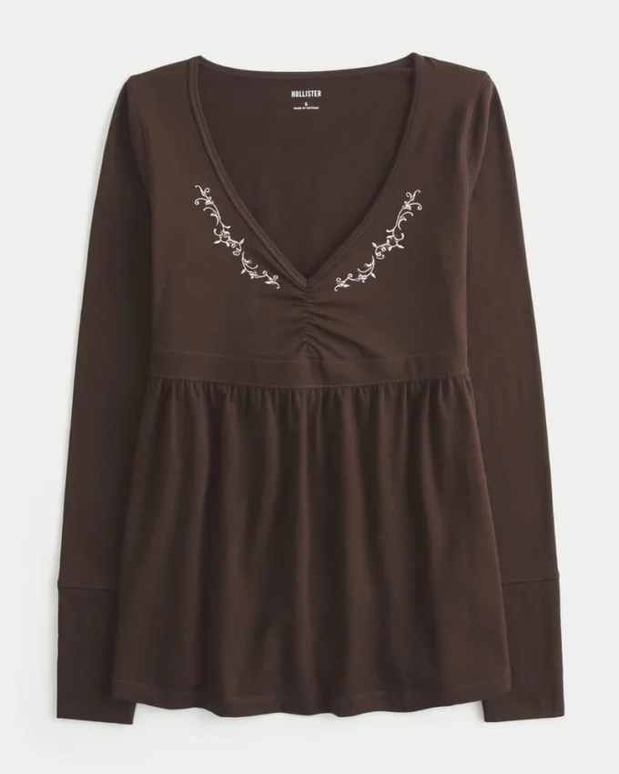 Langærmet babydoll-top med klemning ved brystet Langærmet babydoll-top med klemning ved brystet