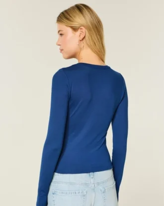 Langærmet sømløs baby-T-shirt i strik