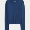 Langærmet sømløs baby-T-shirt i strik