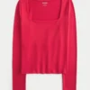 Langærmet, sømløs baby-T-shirt med firkantet halsudskæring