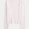 Langærmet, sømløs baby-T-shirt med firkantet halsudskæring