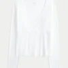Langærmet sømløs wrap-top