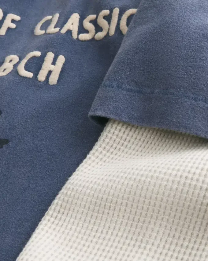 Langærmet T-shirt med surf-logo i flere lag Langærmet T-shirt med surf-logo i flere lag