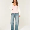 Lavtaljede baggy jeans i medium vask Lavtaljede baggy jeans i medium vask