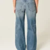 Lavtaljede baggy jeans i medium vask med stjernemønster Lavtaljede baggy jeans i medium vask med stjernemønster