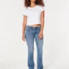 Lavtaljede bootcut-jeans i medium vask Lavtaljede bootcut-jeans i medium vask