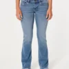 Lavtaljede bootcut-jeans i medium vask Lavtaljede bootcut-jeans i medium vask