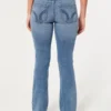 Lavtaljede bootcut-jeans i medium vask Lavtaljede bootcut-jeans i medium vask