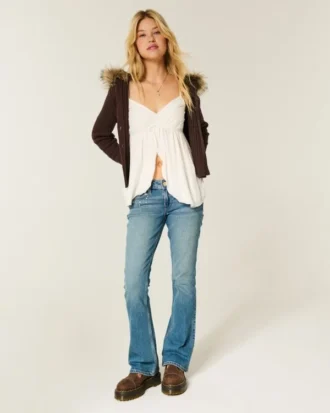 Lavtaljede bootcut-jeans med medium vask og nitter