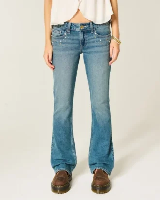 Lavtaljede bootcut-jeans med medium vask og nitter