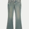Lavtaljede bootcut-jeans med sommerfuglebroderi i medium vask Lavtaljede bootcut-jeans med sommerfuglebroderi i medium vask