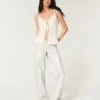 Lavtaljede camouflage-baggyjeans Lavtaljede camouflage-baggyjeans